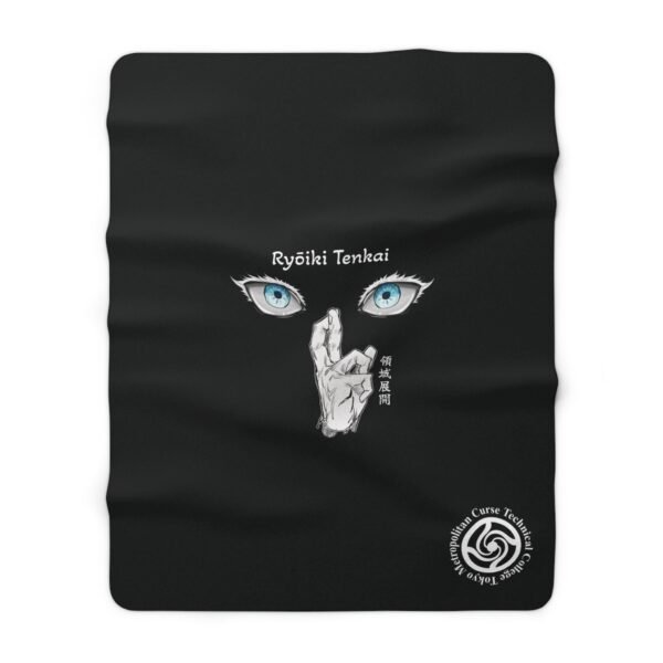 Black blanket with abstract hand and eyes design.